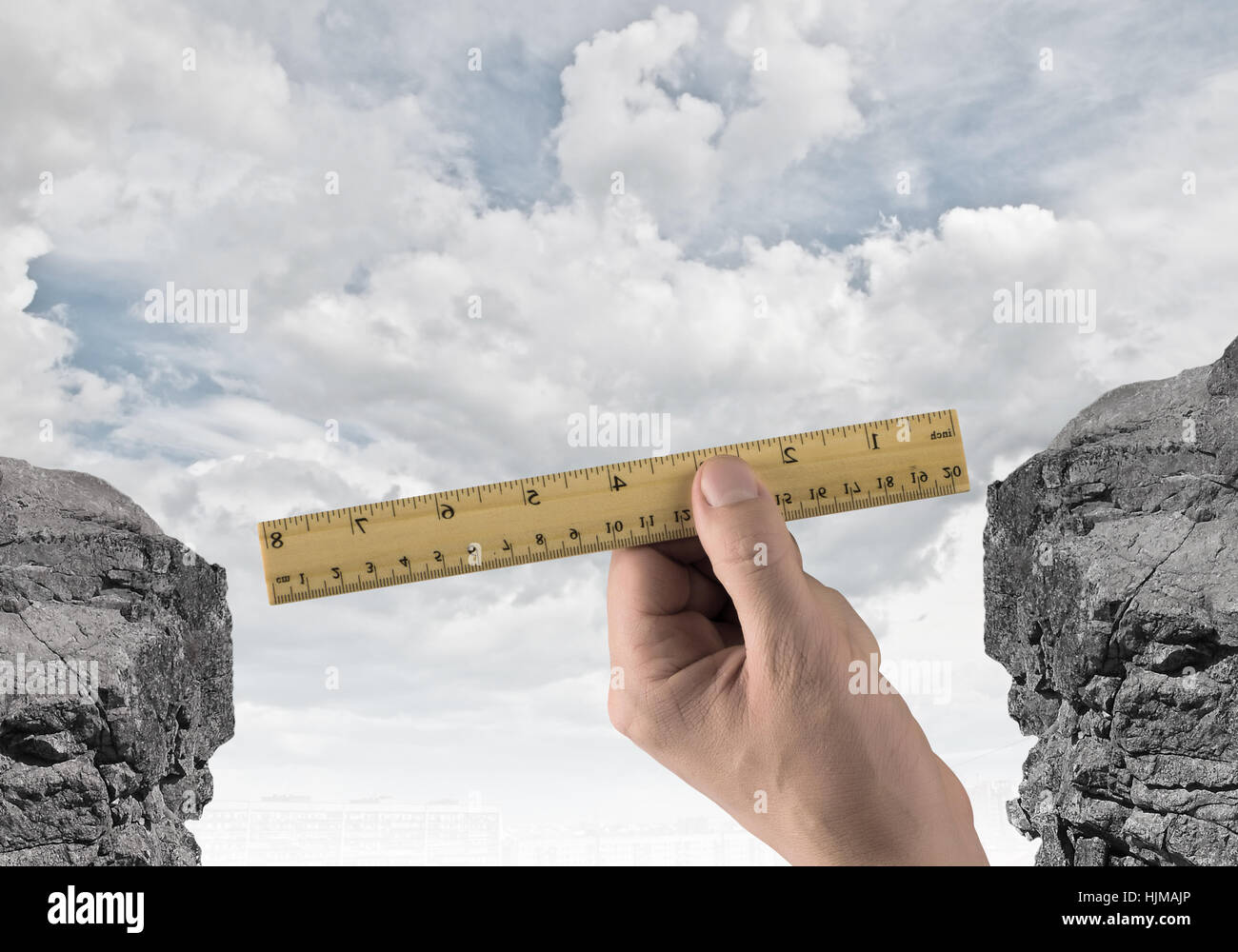 Close up of human hand measuring gap with ruler Stock Photo - Alamy