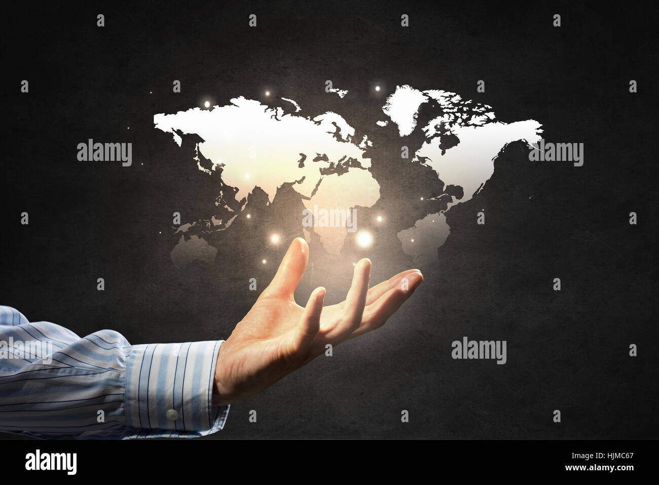 Close up of businessman holding world map in hands Stock Photo - Alamy