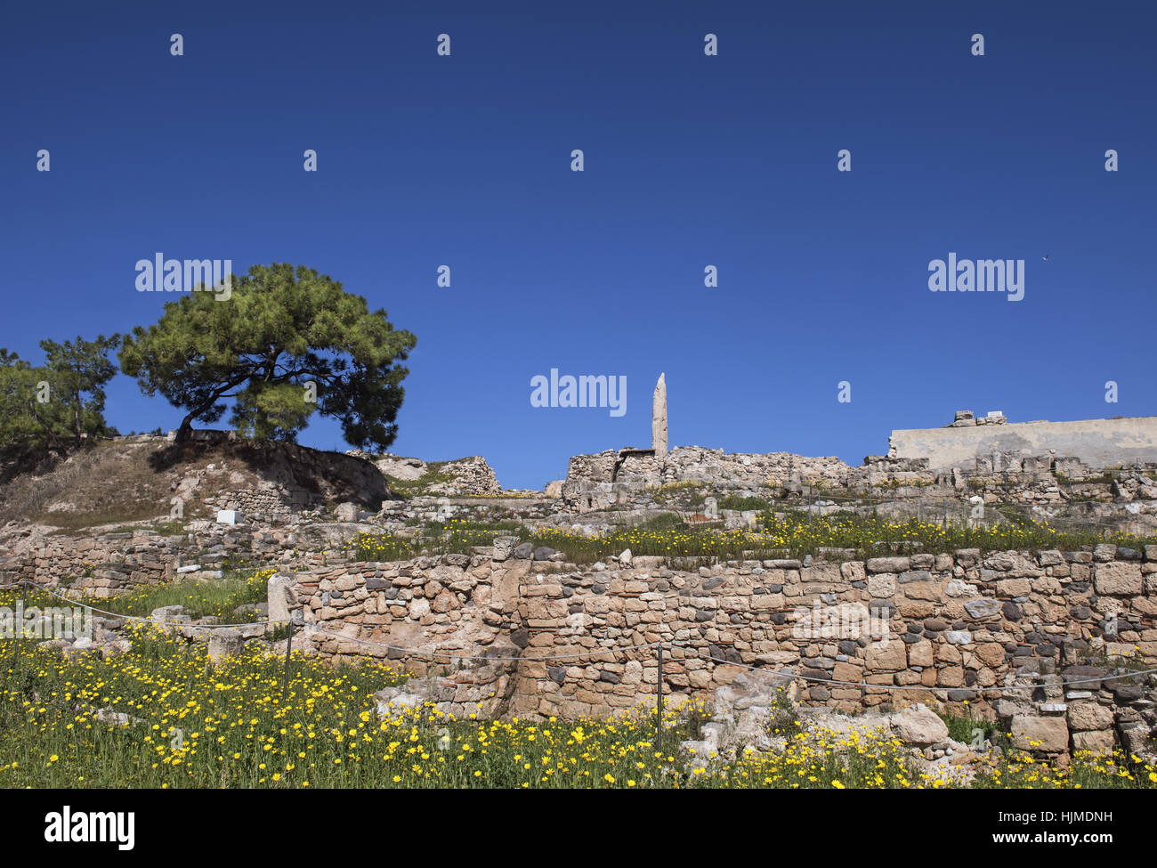 view to 'Kolona' archaeological site in Aegina island in the Saronic gulf, one hour voyage from Piraeus and Athens, Greece Stock Photo