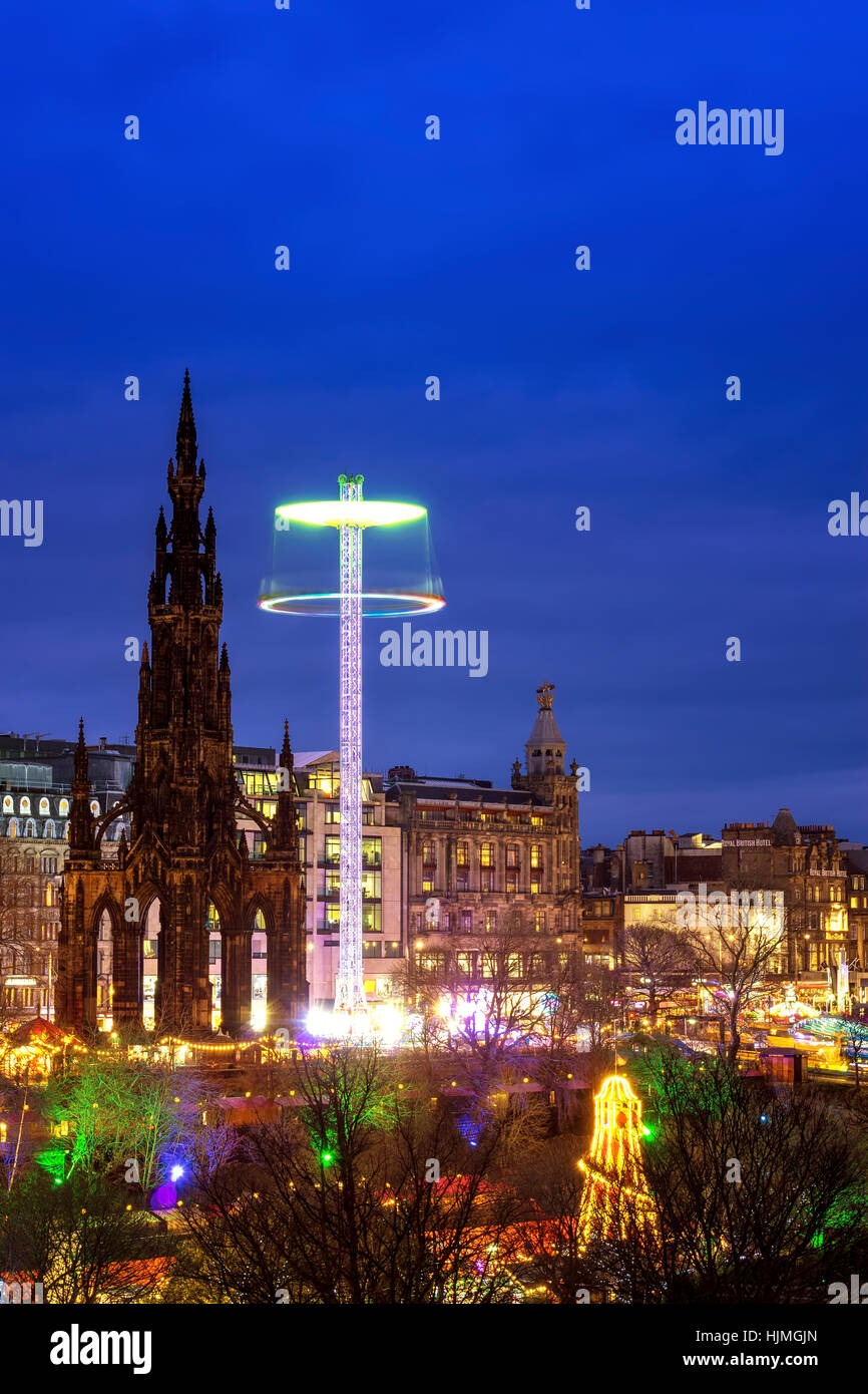 UK, Scotland, Edinburgh, Princes Street Gardens, Scott Monument and lighted fair at Christmas time Stock Photo