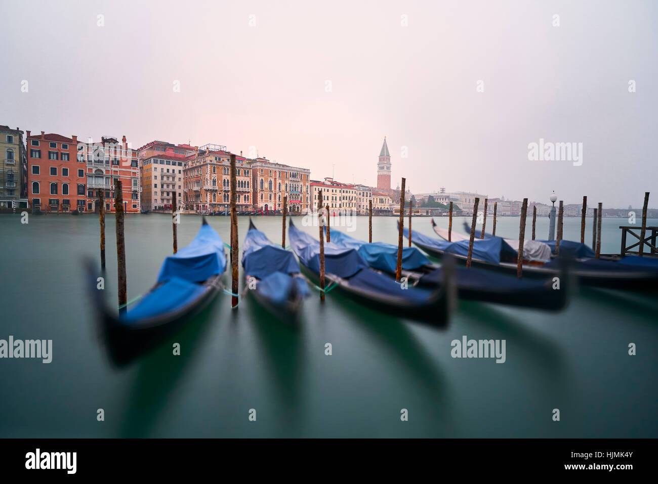 Italy, Venice, moored gondolas at twilight Stock Photo - Alamy