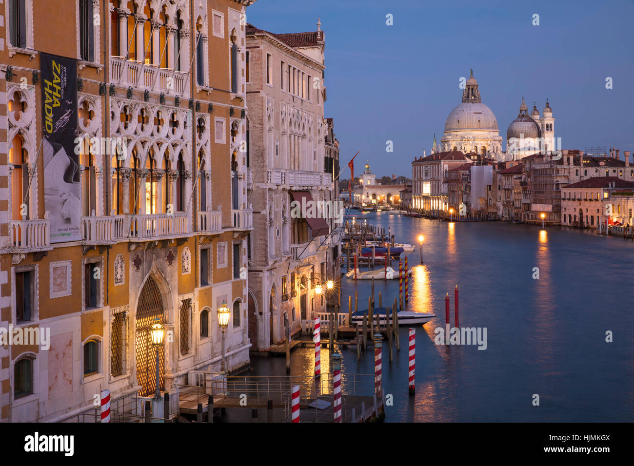 Twilgiht over the buildings along the Grand Canal with Santa Maria della Salute beyond, Venice, Veneto, Italy Stock Photo