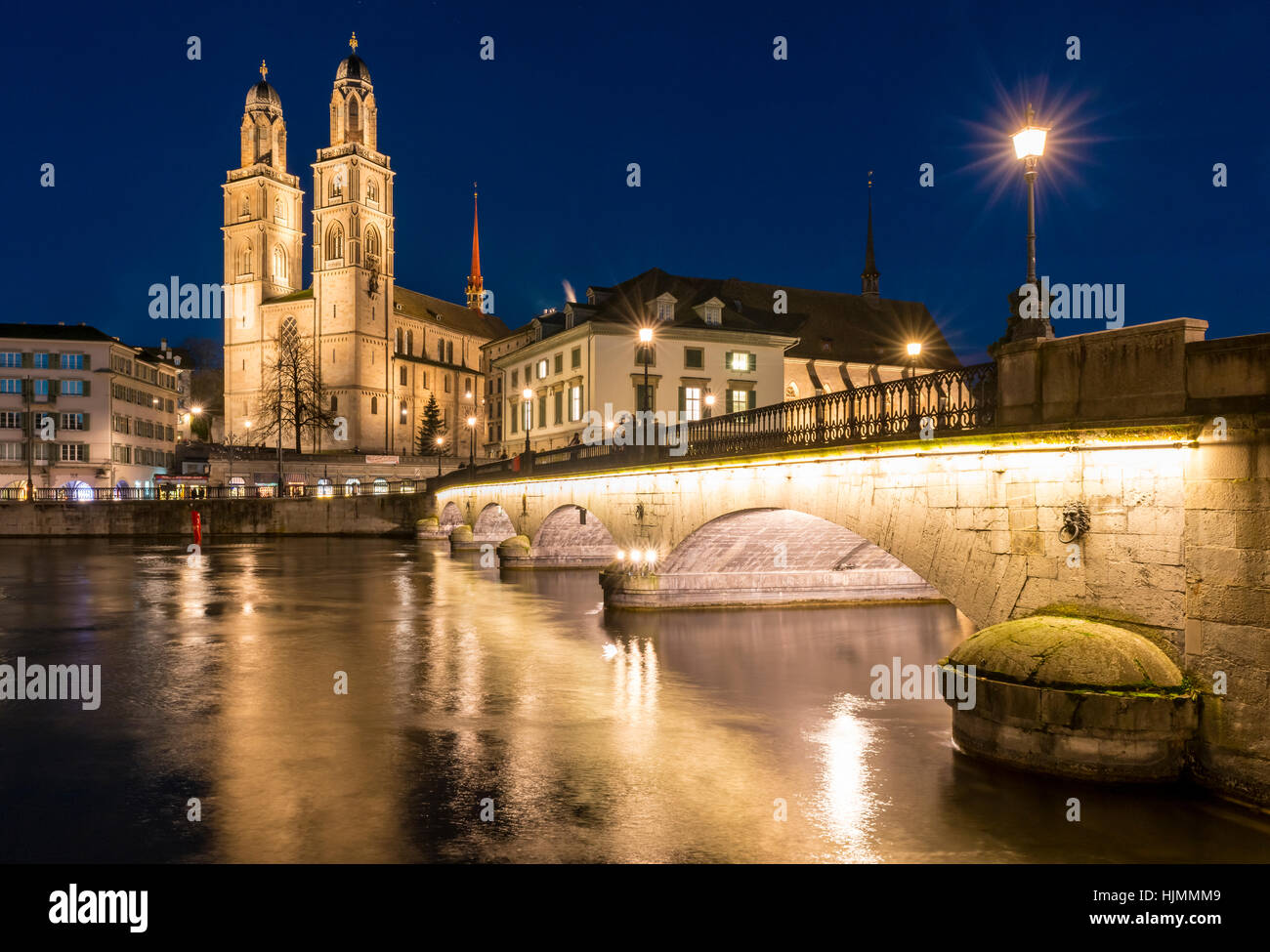 Switzerland, Zurich, view to Great Minster and Muenster Bridge at night