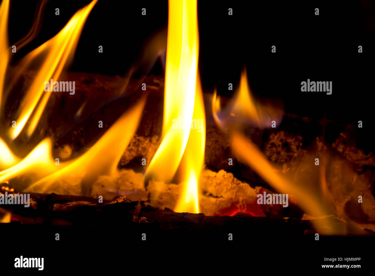 Photo of red fire flame on black background Stock Photo - Alamy