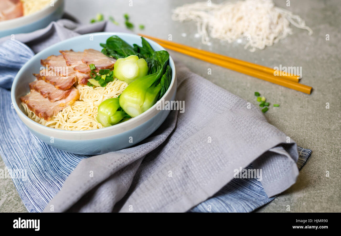 Delicious Egg Noodle With Red Pork And Vegetable In Bowl