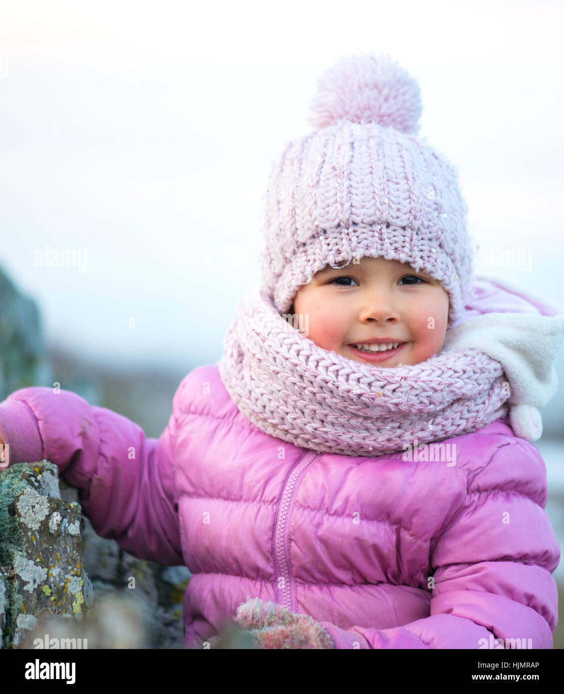 Little girl in winter season with red cheeks Stock Photo Alamy