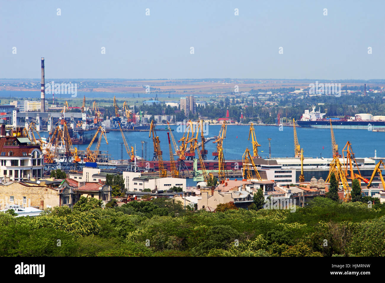 Cargo crane and grain dryer in port Odessa, Ukraine Stock Photo
