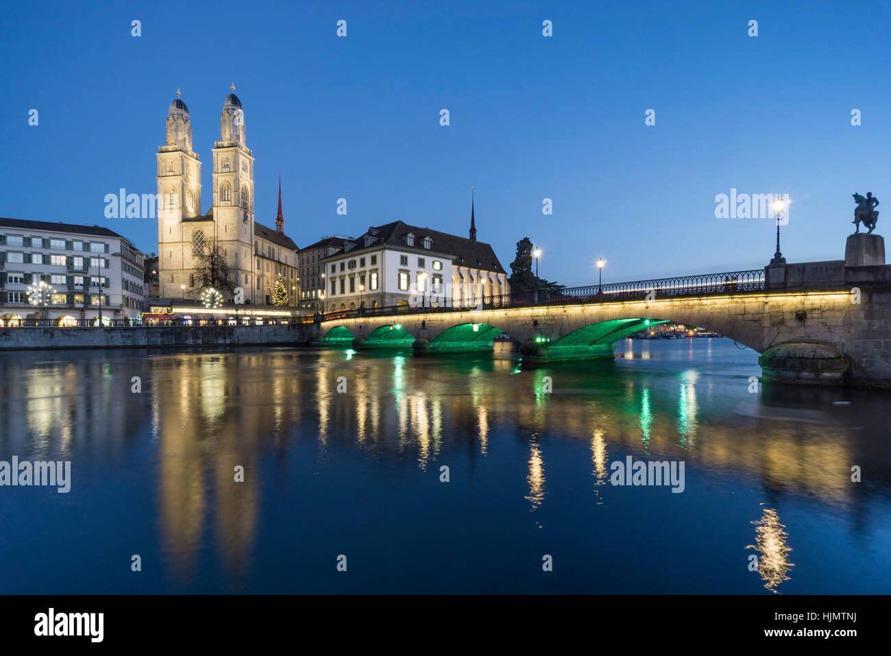 Grossmunster, river Limmat, Munster bridge, christmas illumination, Zurich, Switzerland Stock Photo