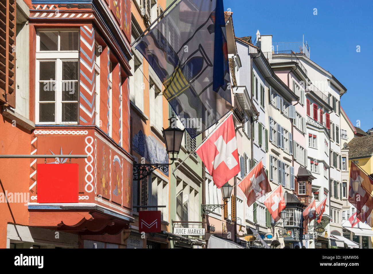 Augustinergasse, Agustiner alley, swiss national flag,  Zurich, Switzerland Stock Photo