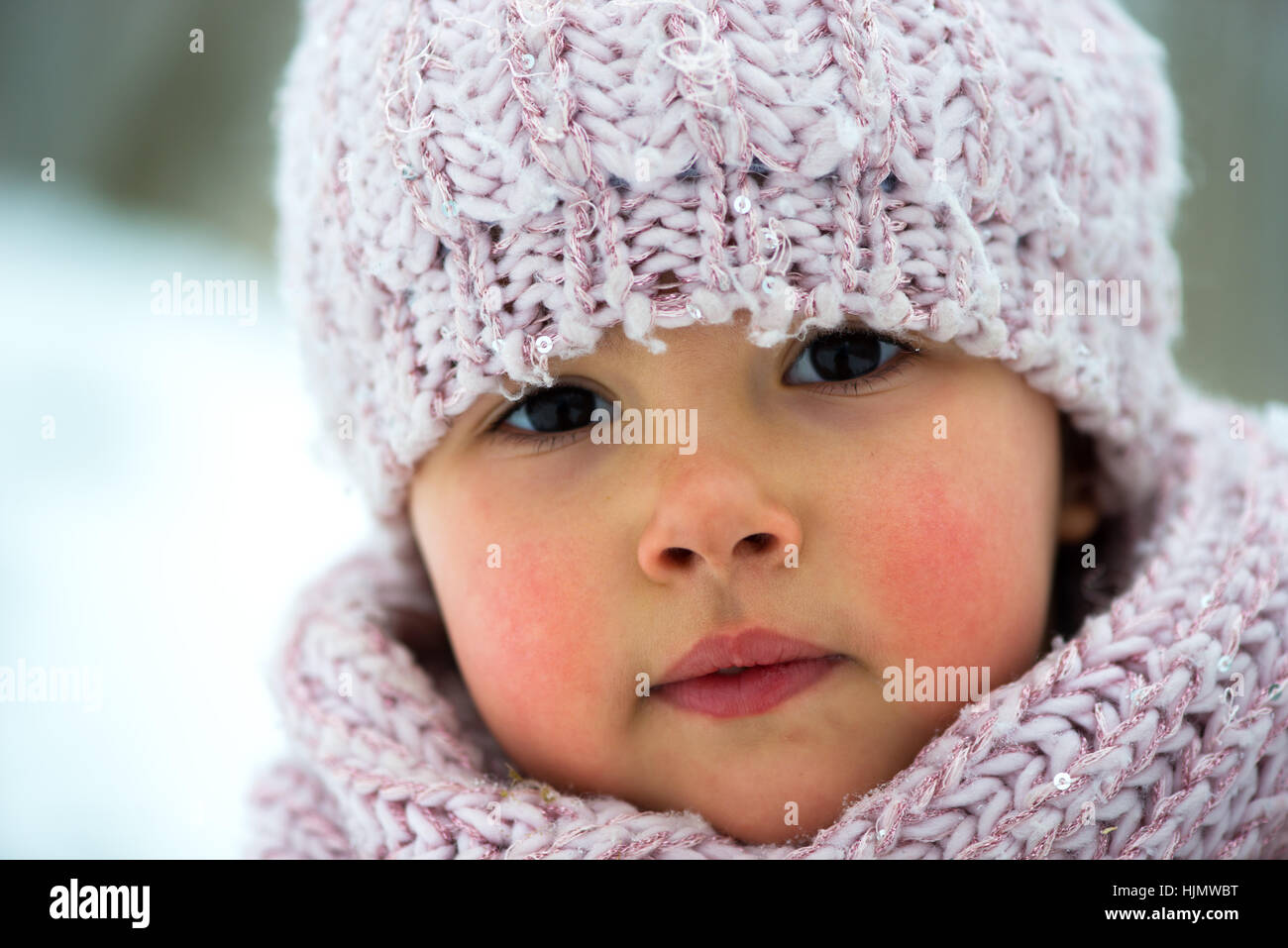 Little girl in winter season with red cheeks Stock Photo Alamy