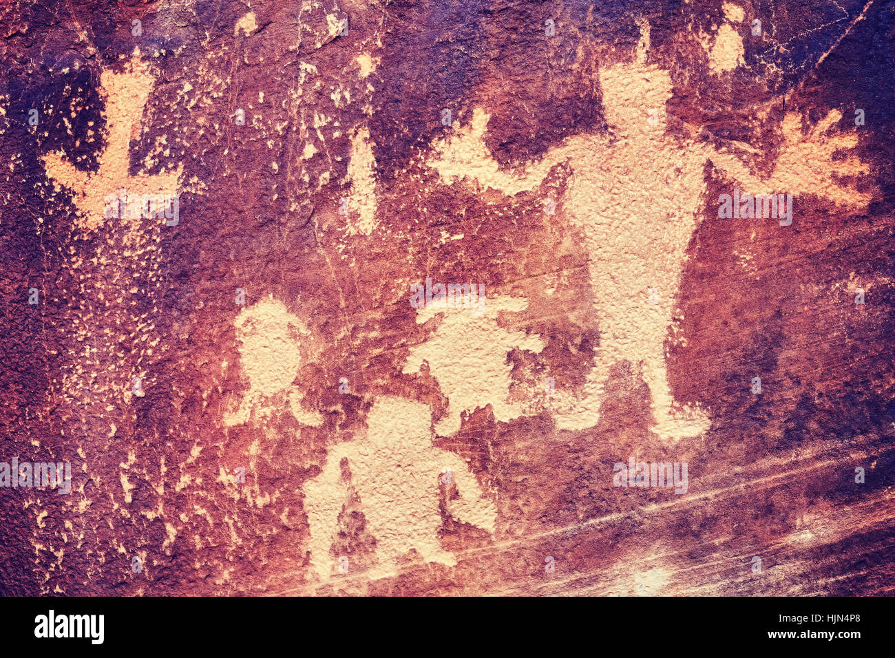 Color toned petroglyphs, ancient culture background, Dinosaur National Monument, Utah, USA. Stock Photo