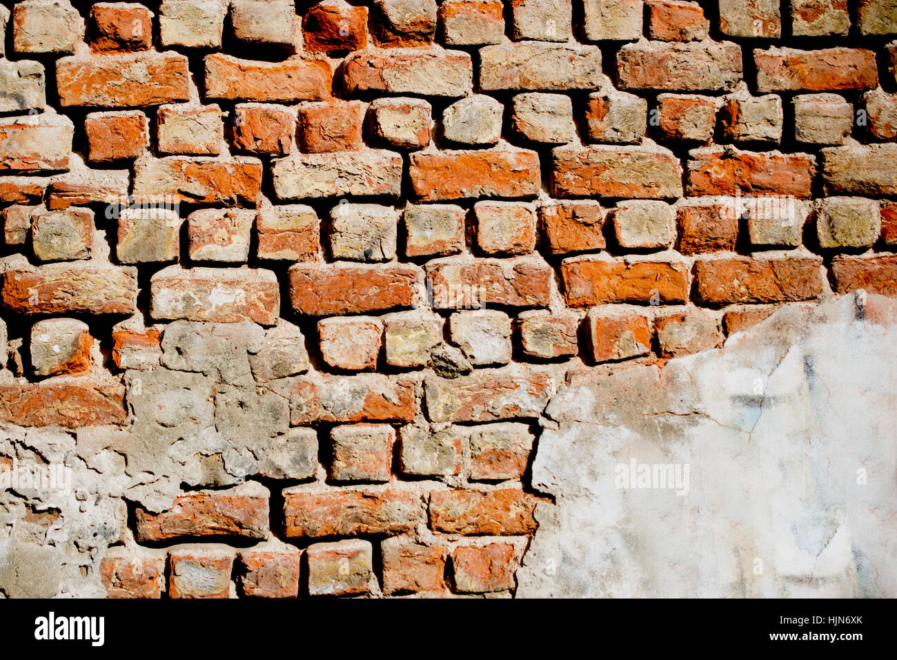 Old grunge brick wall as a background Stock Photo - Alamy