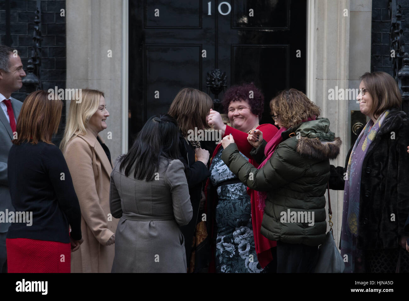 Claire Throssell, whose children were killed by her abusive ex-husband in 2014, hands in petition to Downing Street in London calling for an end to unsafe child contact with dangerous perpetrators of domestic violence. Stock Photo