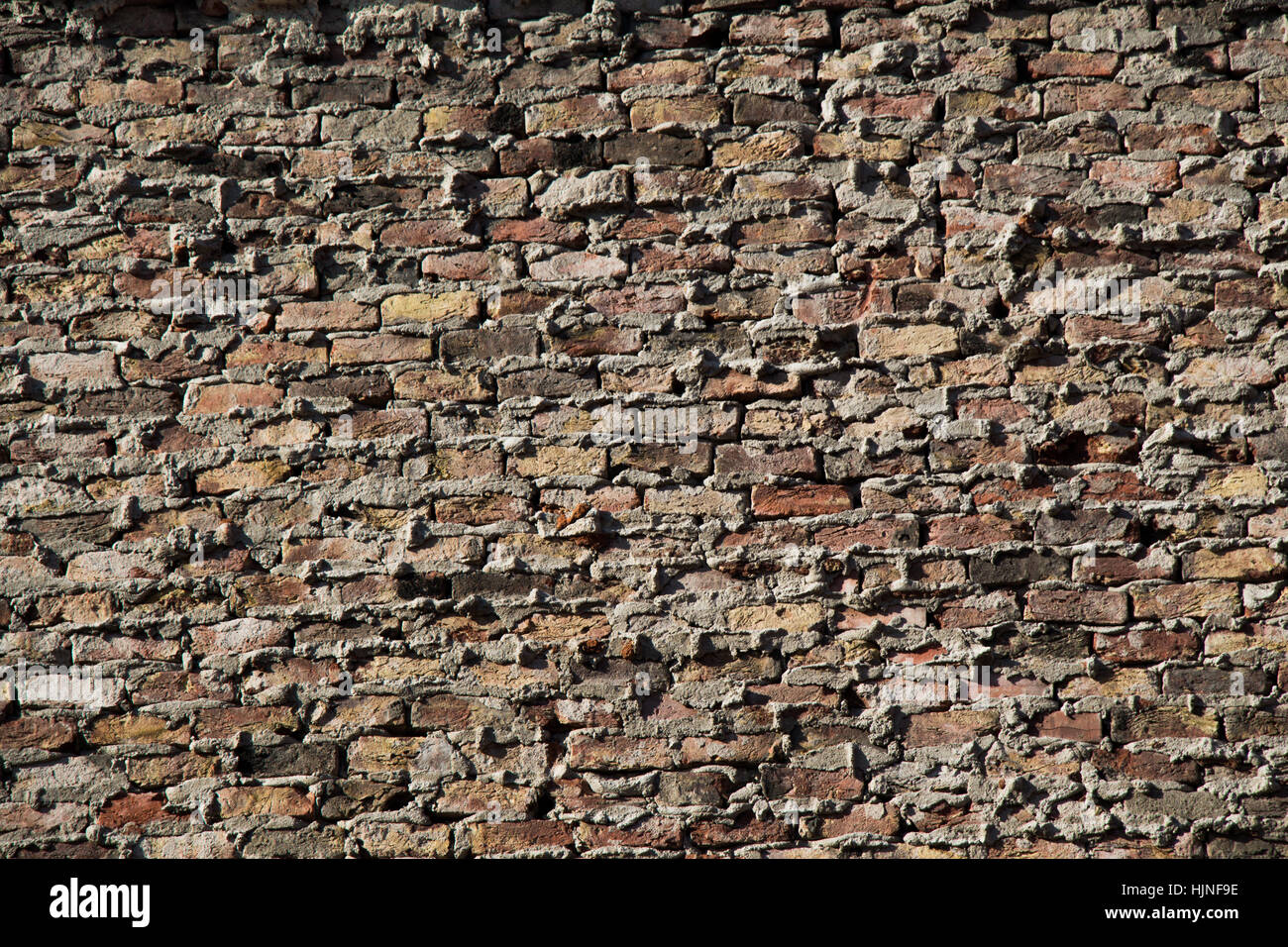 Old grunge brick wall as a background Stock Photo - Alamy
