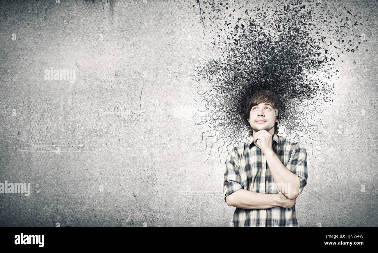 Handsome minded young man hi-res stock photography and images - Alamy