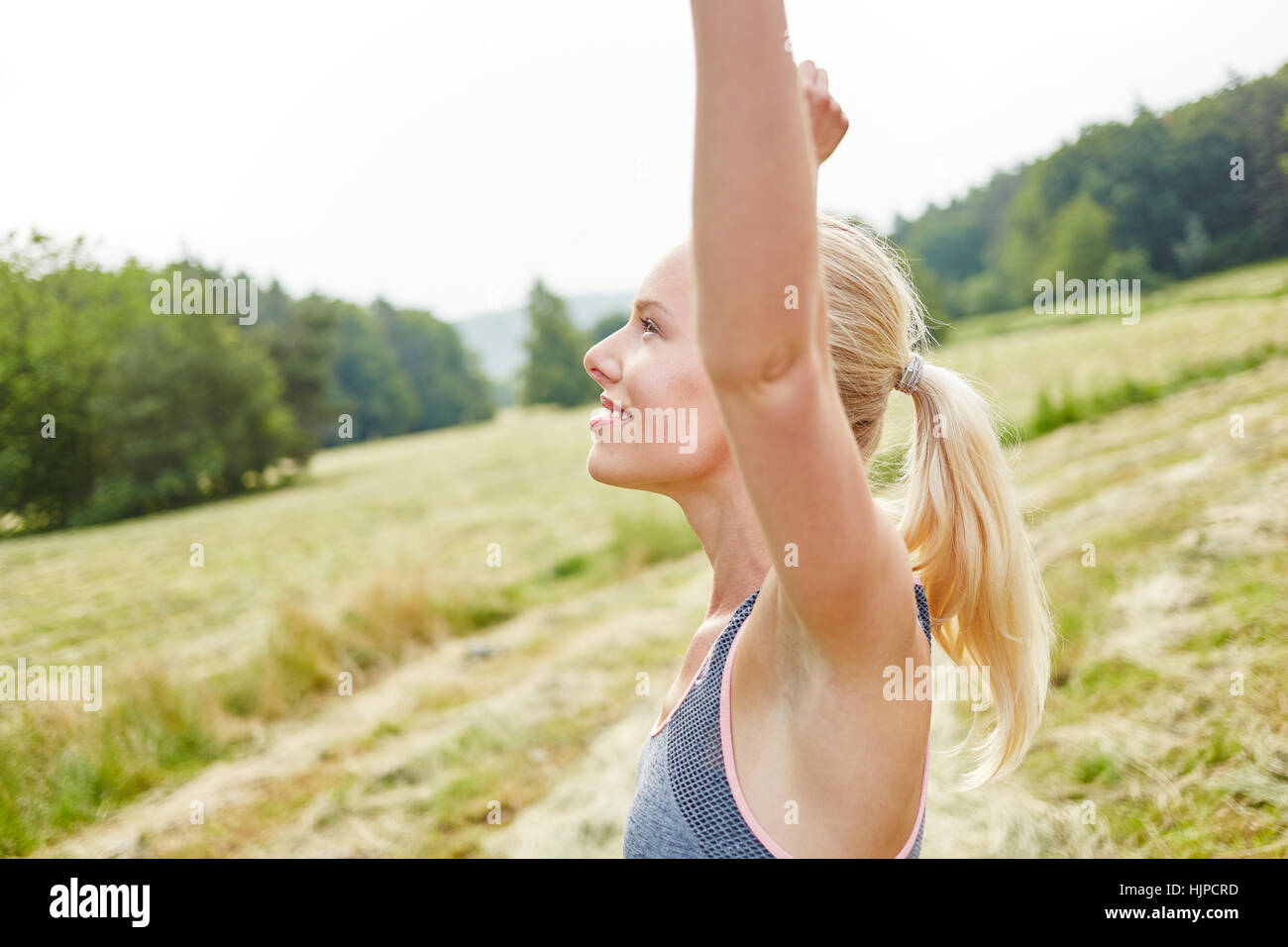 Woman breathing deeply as yoga exercise in the nature Stock Photo Alamy