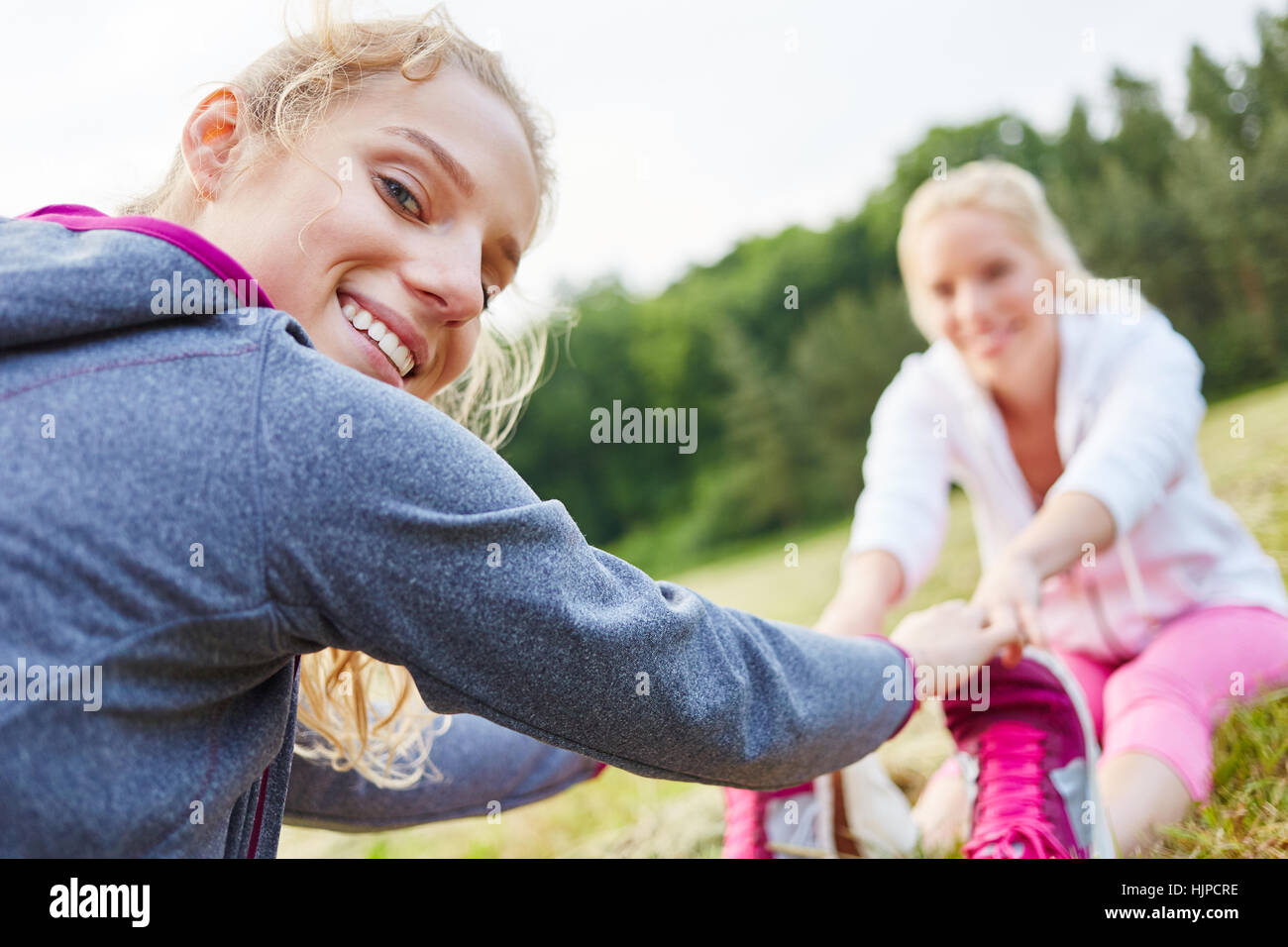 Woman warming up together before fitness class Stock Photo