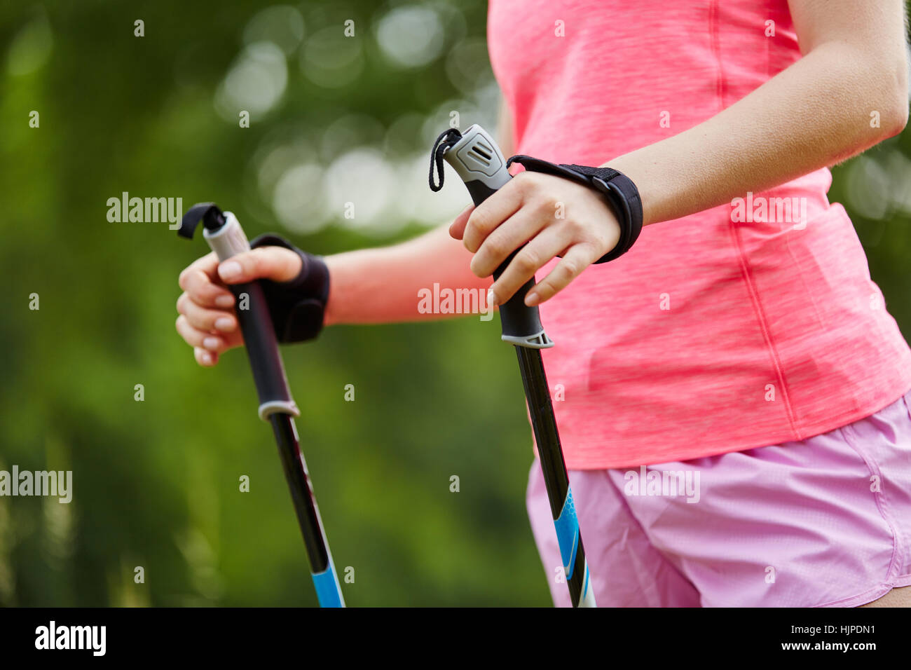 Walking sticks for nordic walking in the nature Stock Photo