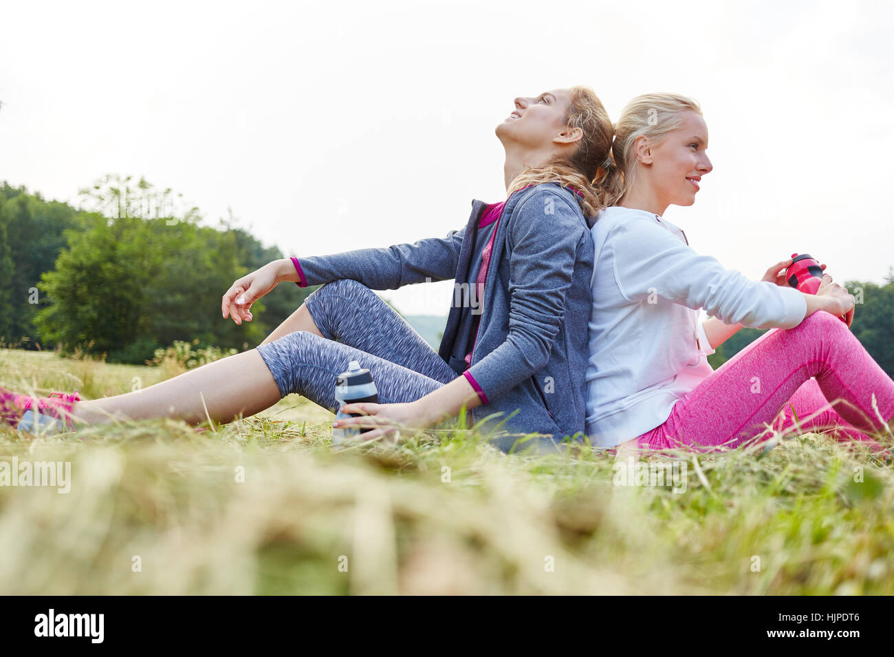 Young women taking a break and relax after training Stock Photo