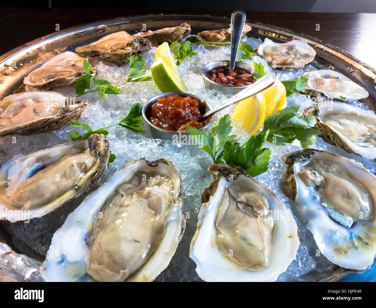 Raw Oysters on the Halfshell, Gourmet Restaurant Dining, USA Stock Photo