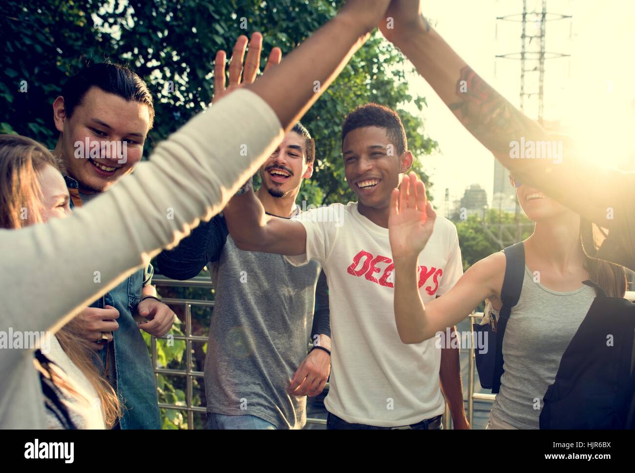 Diverse Group People High Five Concept Stock Photo - Alamy