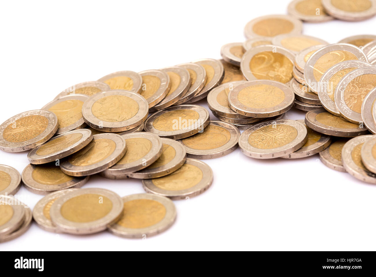 Heap of two euro coins isolated on white background Stock Photo - Alamy