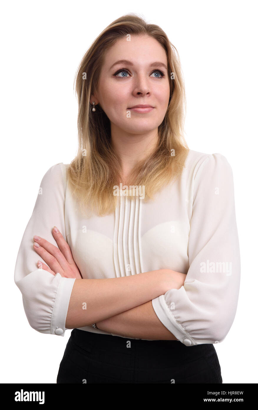 confident beautiful woman with her arms crossed looking up Stock Photo ...