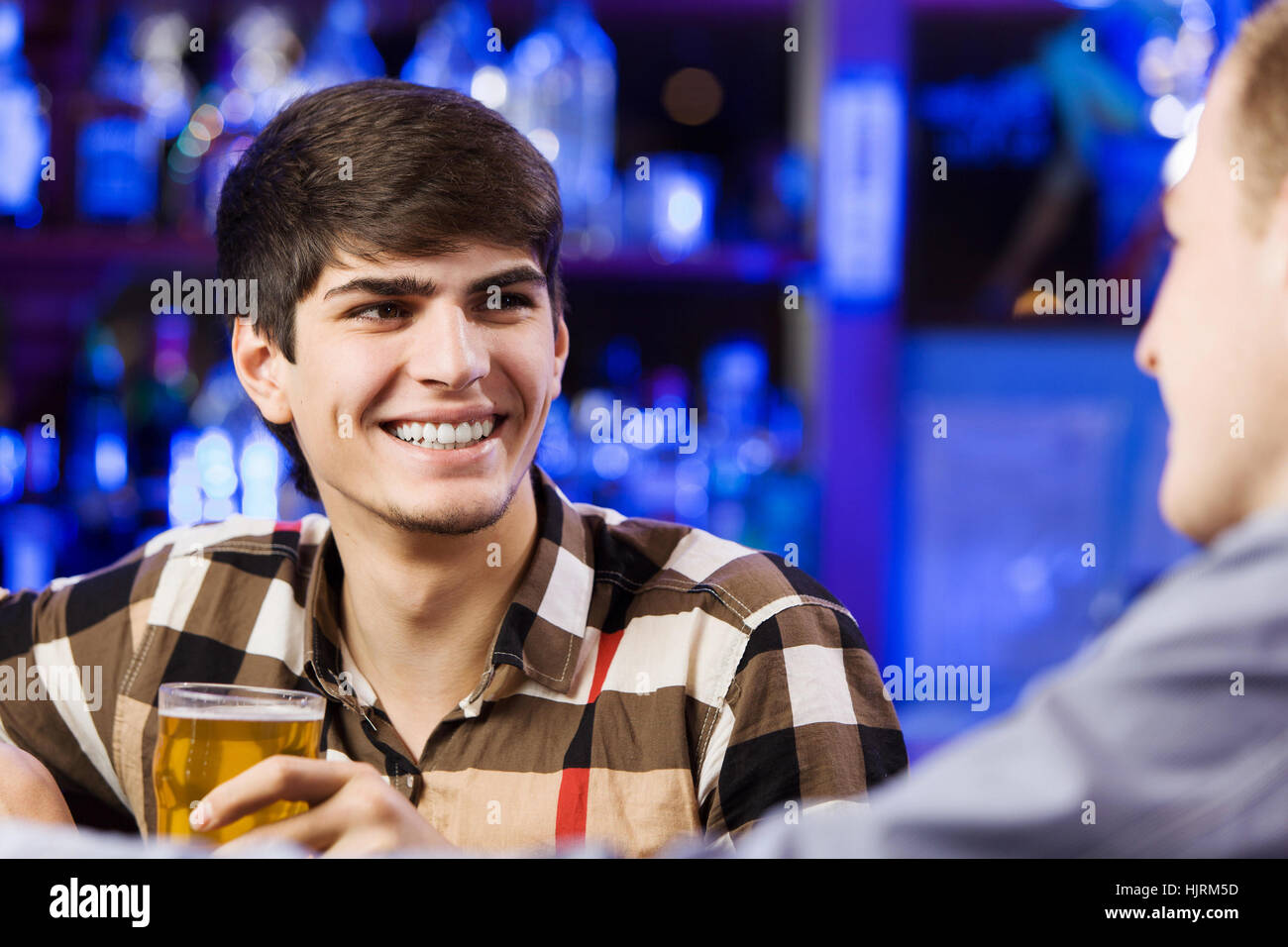 Young men bar hi-res stock photography and images - Alamy