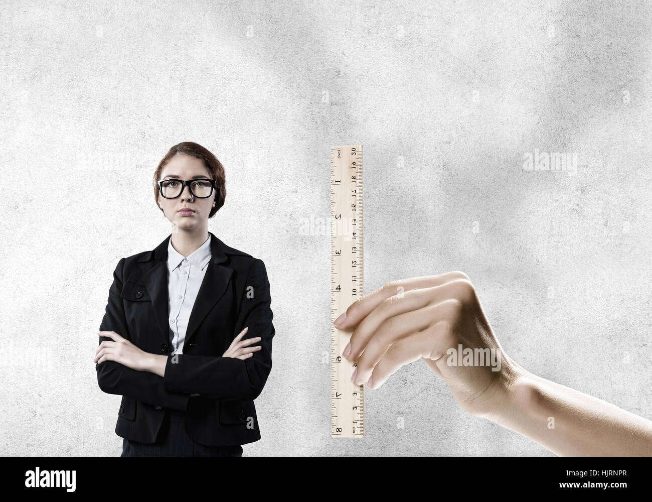 People hands measuring businesswoman with wooden rulers Stock Photo - Alamy