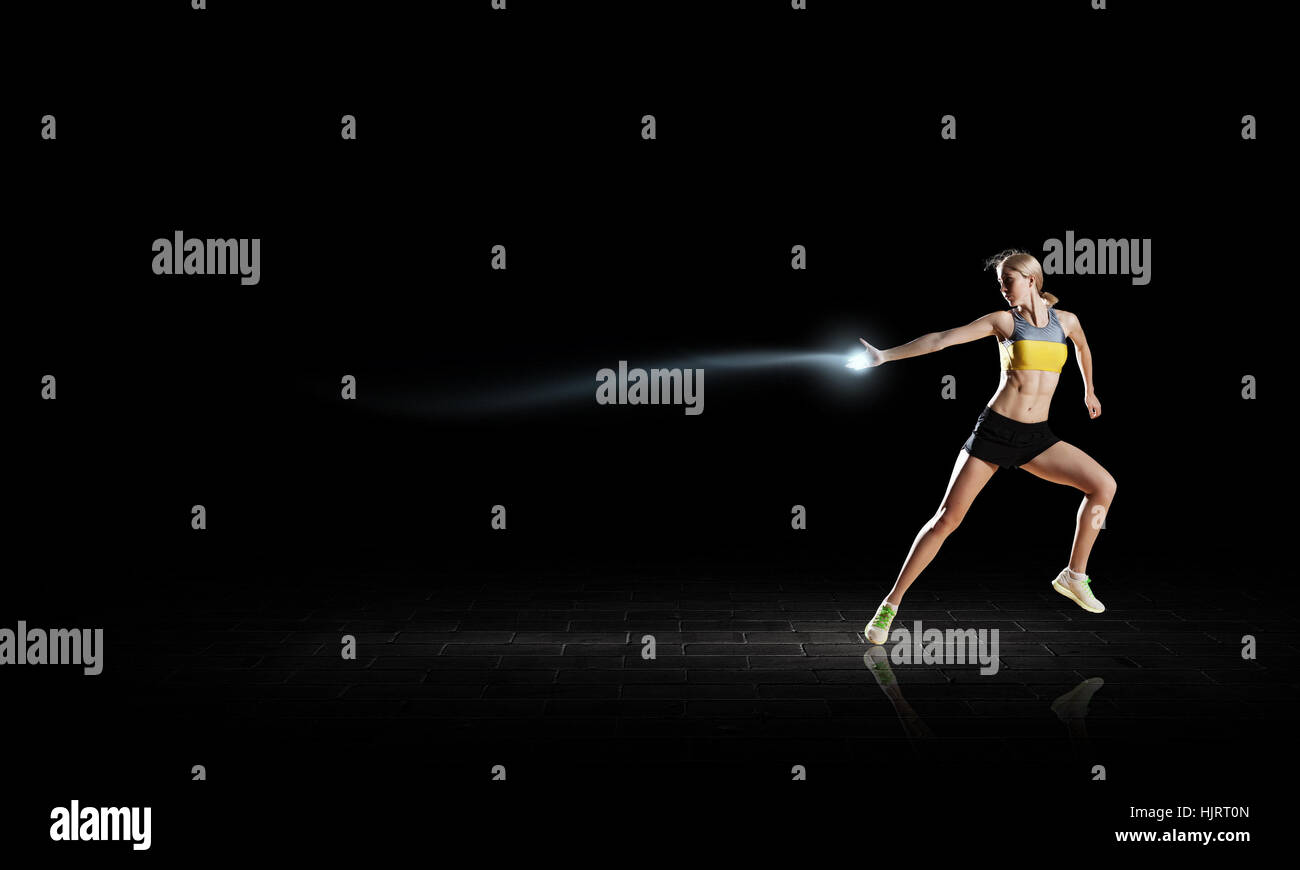 Young black woman running hi-res stock photography and images - Alamy