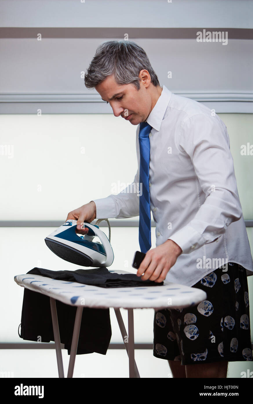 telephone, phone, cellphone, mobile, mobile phone, pants, concentration, front Stock Photo