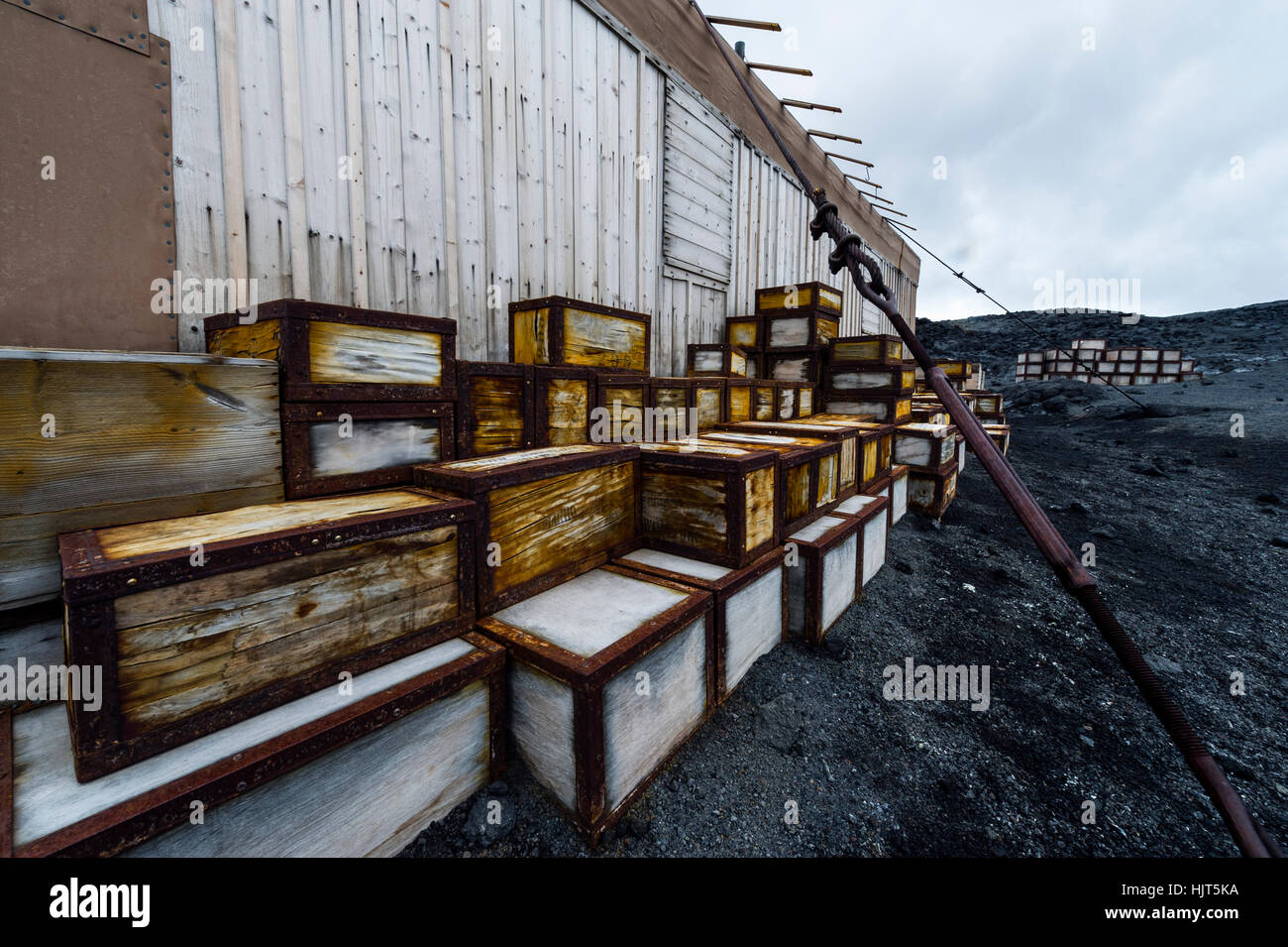 Food supplies and storage boxes outside the hut of Antarctic explorer Ernest Shackleton. Stock Photo