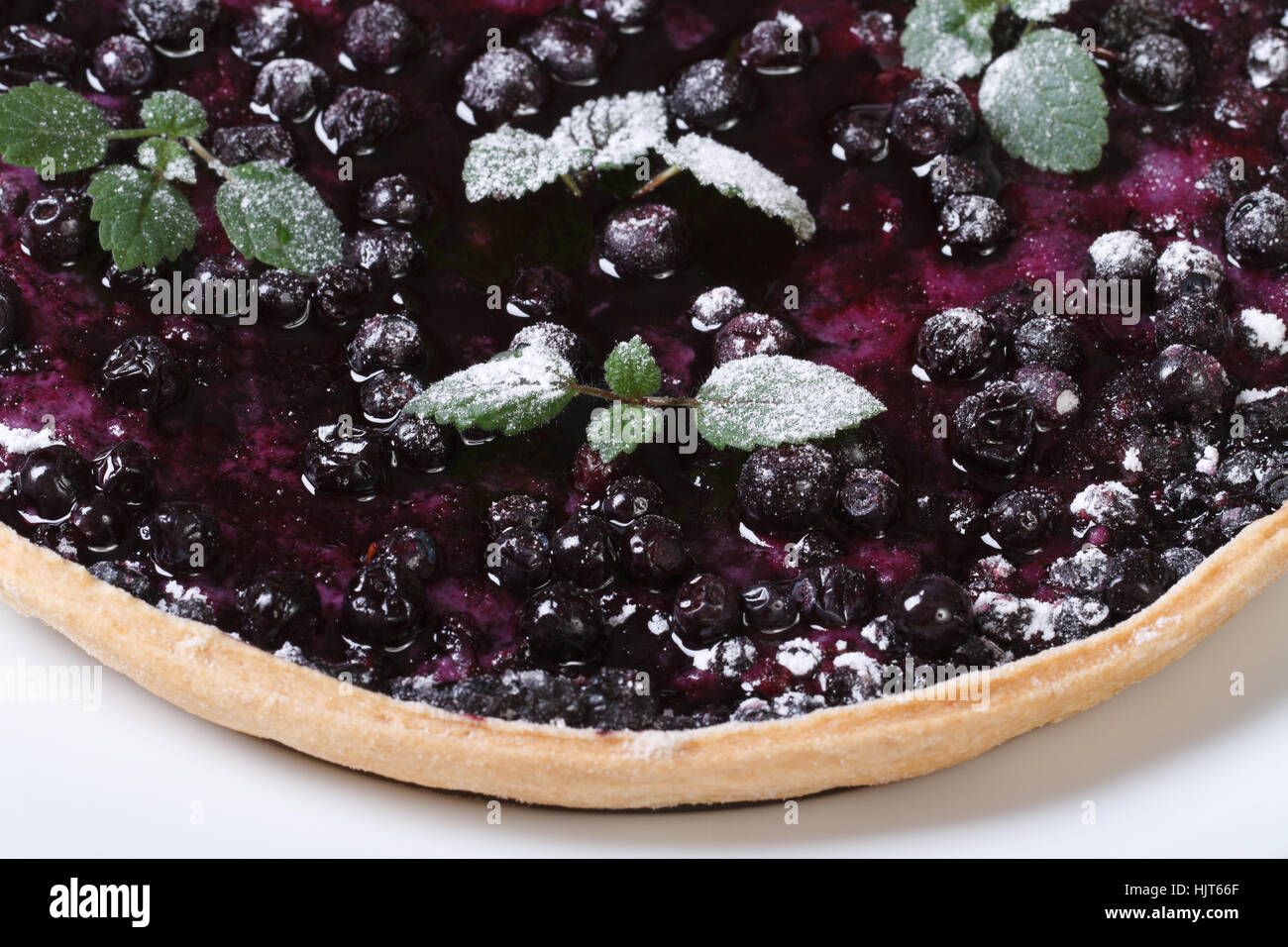 blueberry pie with mint and powdered sugar macro horizontal top view Stock Photo