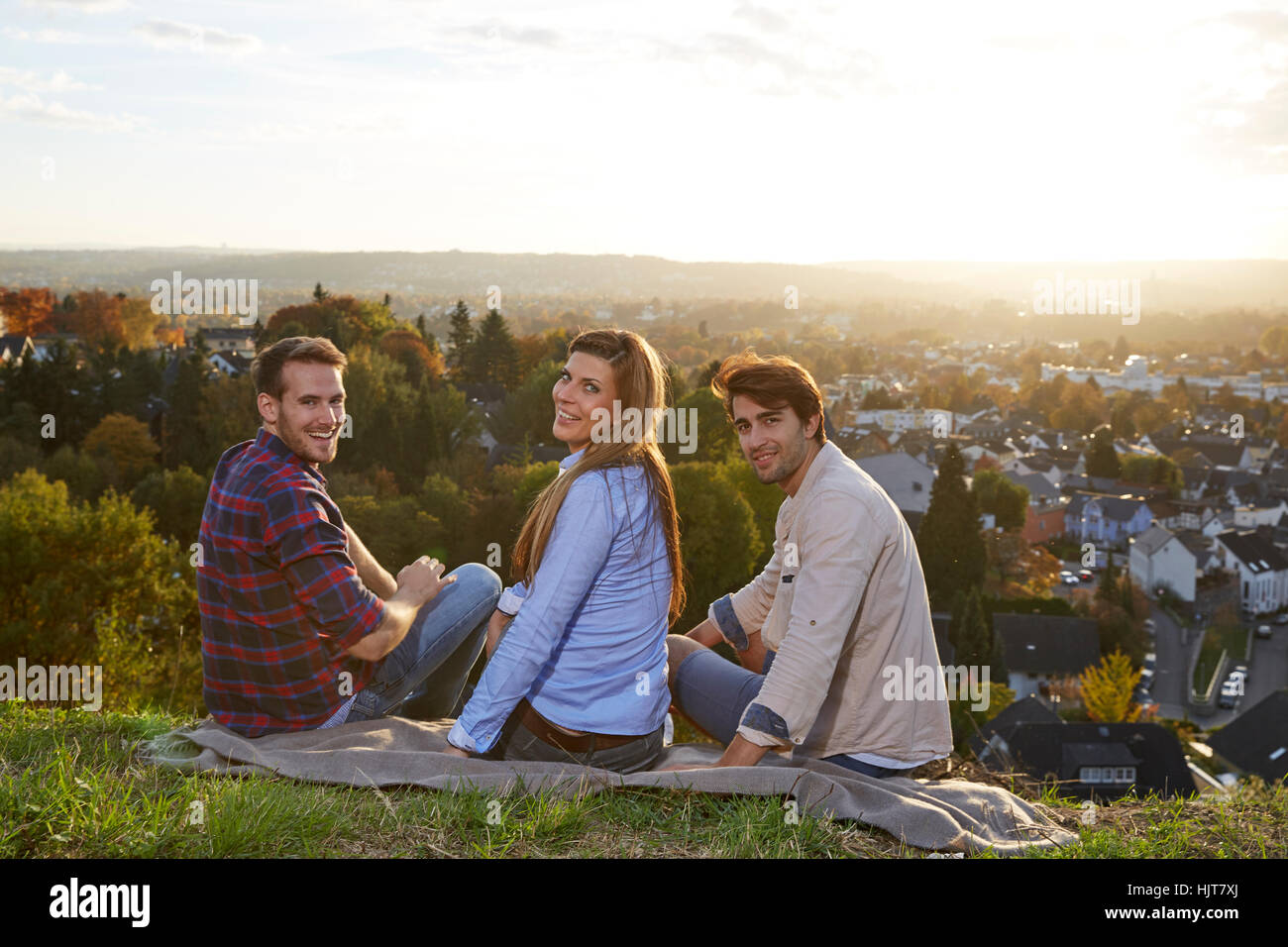 Man sitting on small hill hi-res stock photography and images - Alamy