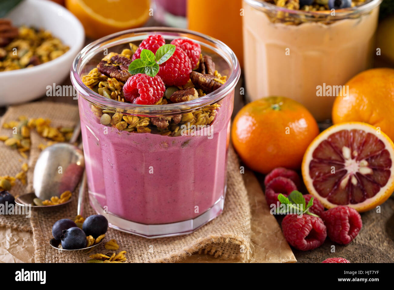 Healthy orange and raspberry smoothie Stock Photo Alamy