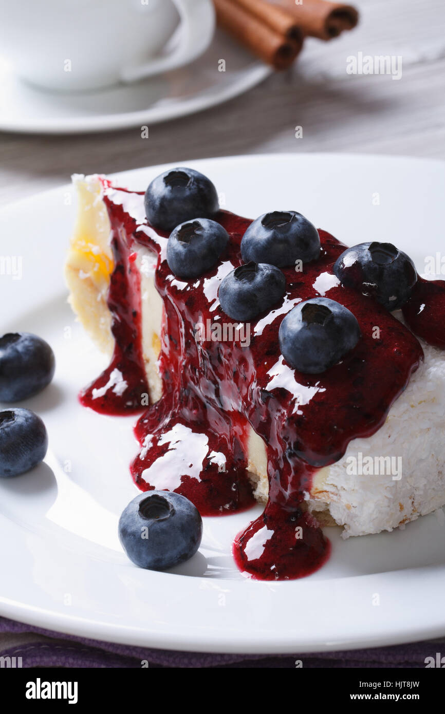 Cake with blueberries on white plate closeup and coffee on the table c Stock Photo