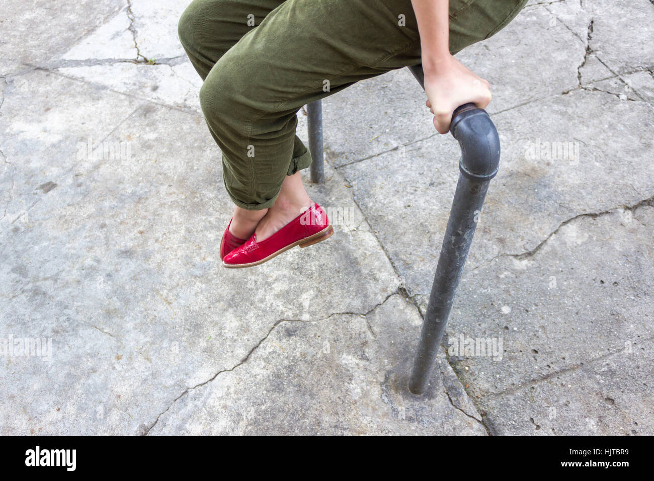 grey jeans red shoes