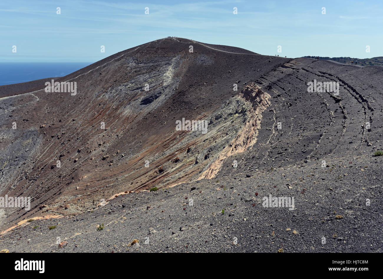 Hiking around the impressive grand crater of Vulcano Island Stock Photo