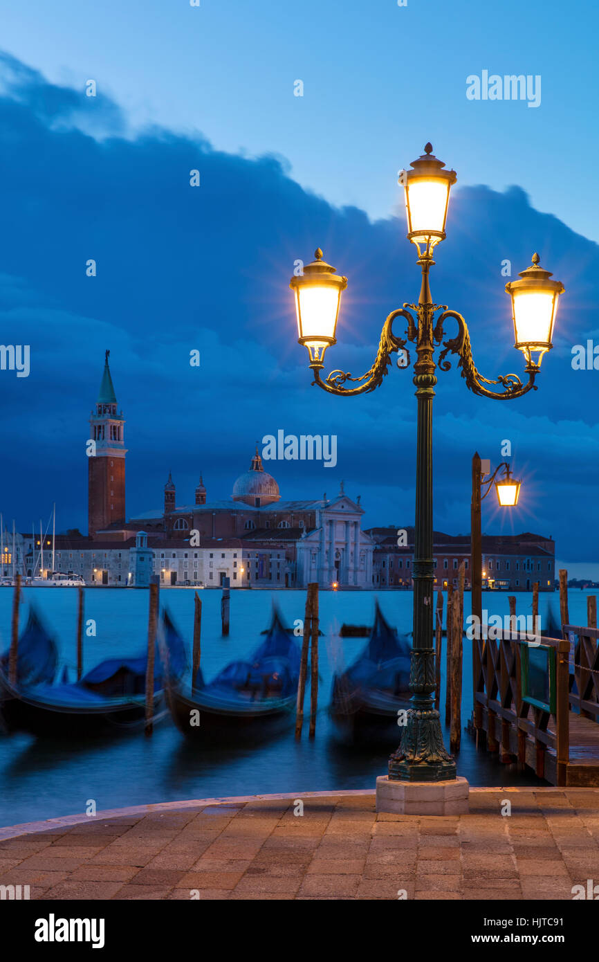 Early morning view over Gondolas and San Giorgio Maggiore, Venice, Veneto, Italy Stock Photo
