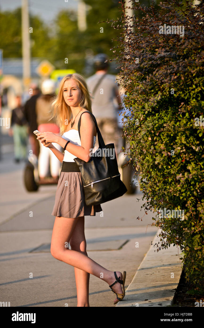 Blonde girl standing on the streets of Budapest, Hungary Stock Photo