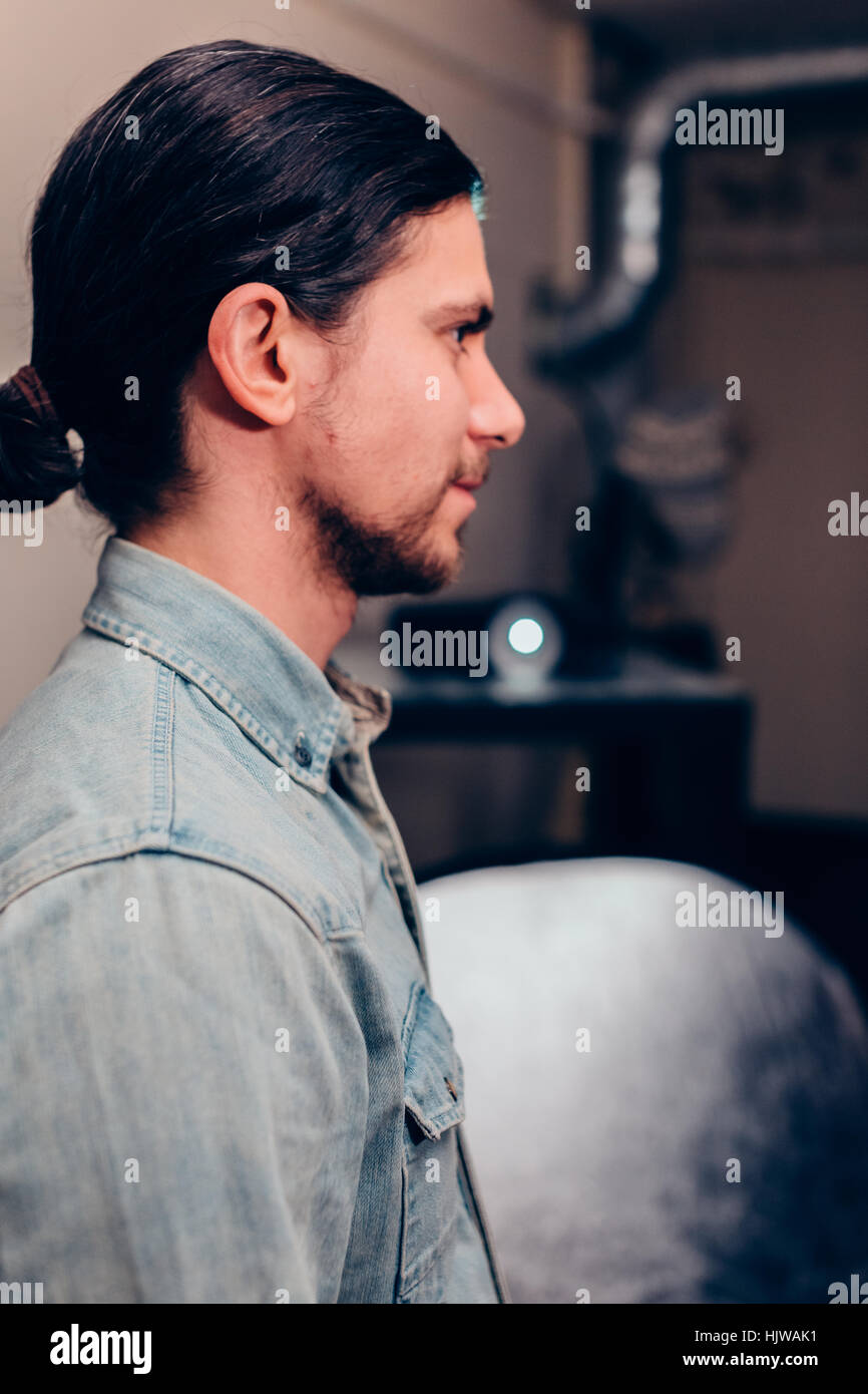 Man in denim jacket Stock Photo