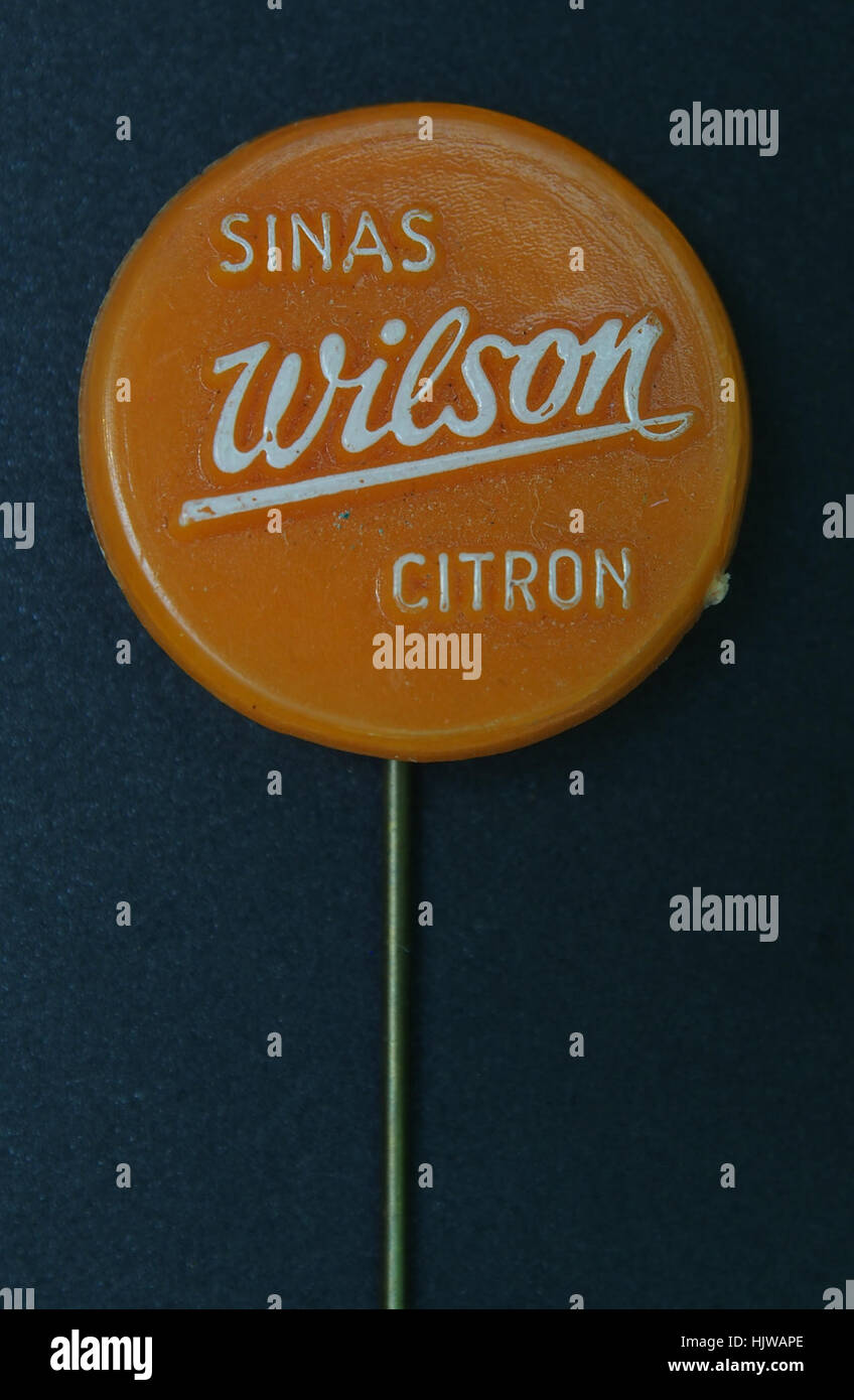 The Wilson Sinas advertising pin, a collectible item used for ...