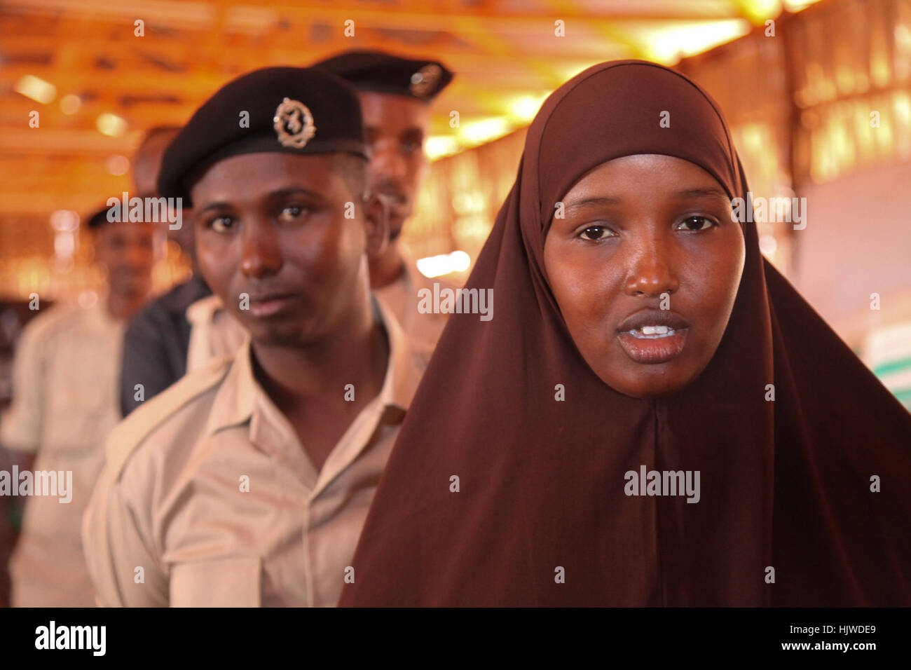 New recruits for the Interim Jubbaland Administration (IJA) line up for a medical checkup at Kismayo Police Training School during the vetting exercise in Kismayo Somalia on December 21, 2016.  Barut Mohamed Stock Photo