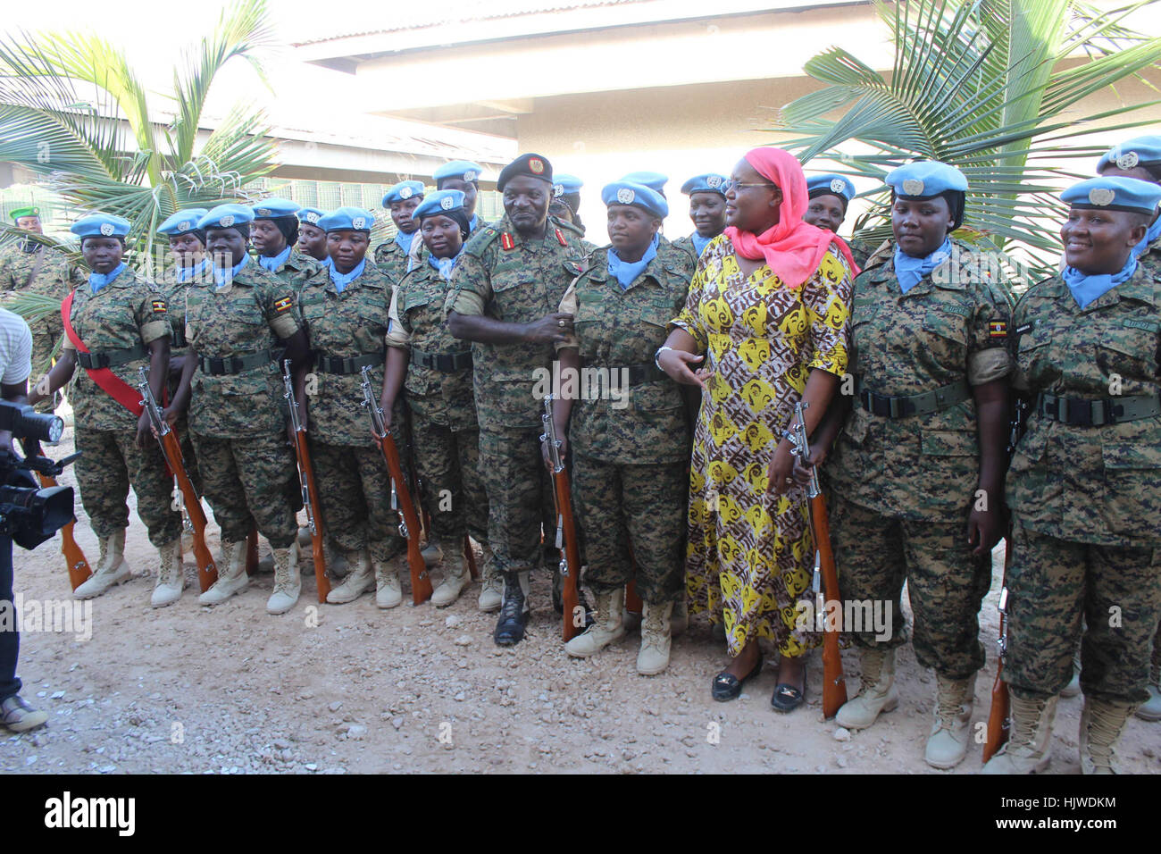 General Katumba Wamala The Chief Of Defence Forces Of Uganda Middle Front Row In A Group Photo With Ugandan Female Soldiers Serving Under The United Nations Guard Unit Ungu In Somalia On