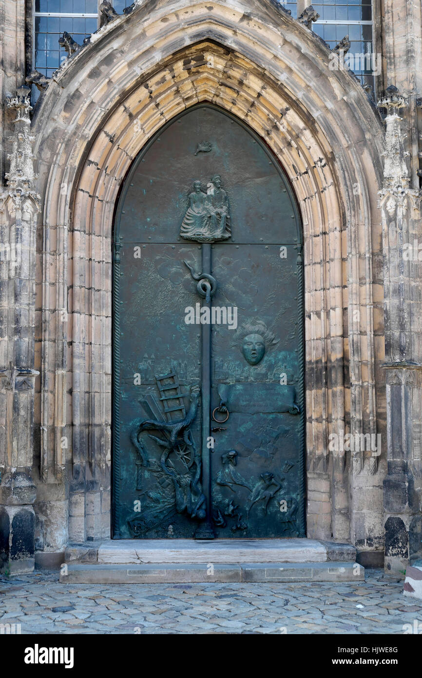 Church portal shows destroyed city, St. John's Church, Magdeburg, Saxony-Anhalt, Germany Stock Photo