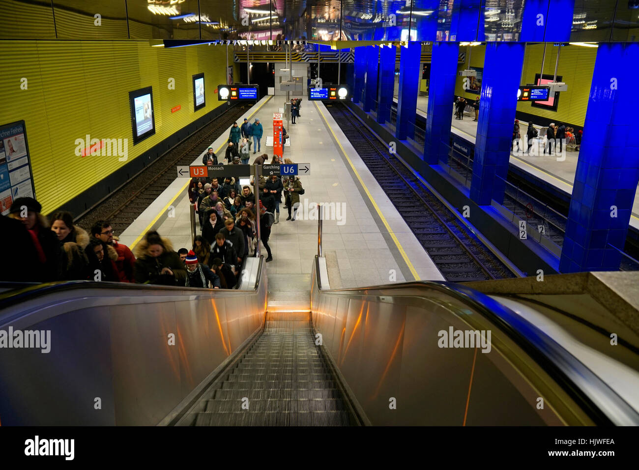 People on escalator, subway station Münchner Freiheit, Munich, Upper Bavaria, Bavaria, Germany Stock Photo