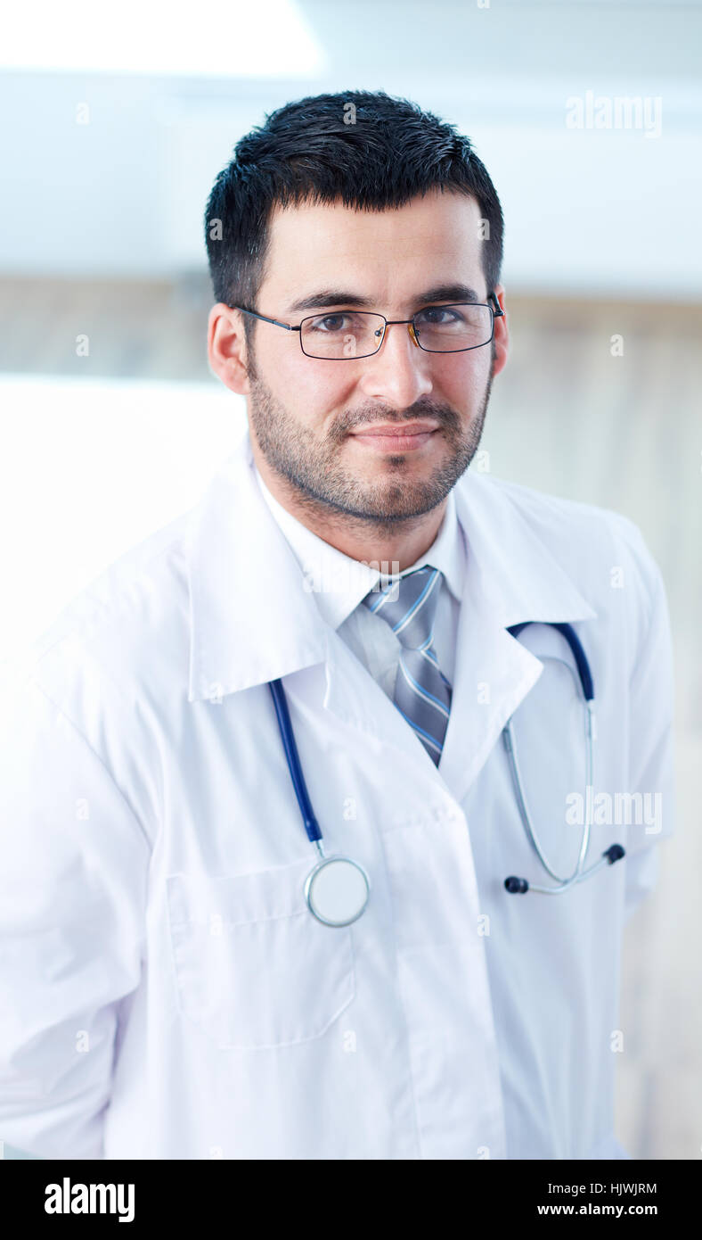 Young unshaven male doctor hi-res stock photography and images - Alamy