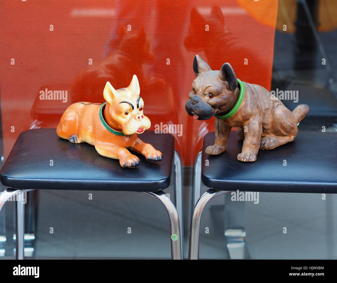 Photo series 'dogs in Berlin' -  Cheese dog figures are seen in the window of a cheap second hand shop in Berlin on February 15, 2016. Berlin is often called the 'capital of dogs'. This picture is part of a long-term project on dogs in Berlin. Photo: Wolfr | usage worldwide Stock Photo
