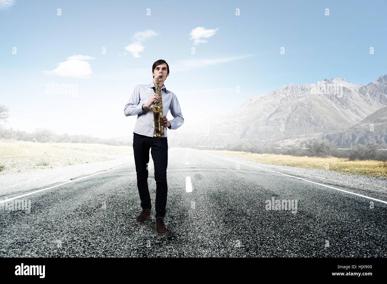 Walking young man in suit hi-res stock photography and images - Alamy