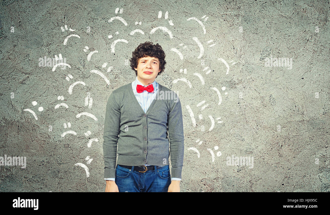 Upset hopeless sad young man hi-res stock photography and images - Alamy